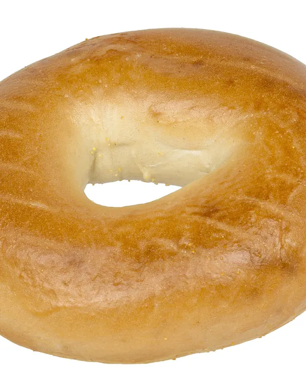 Plain golden bagel on a white background