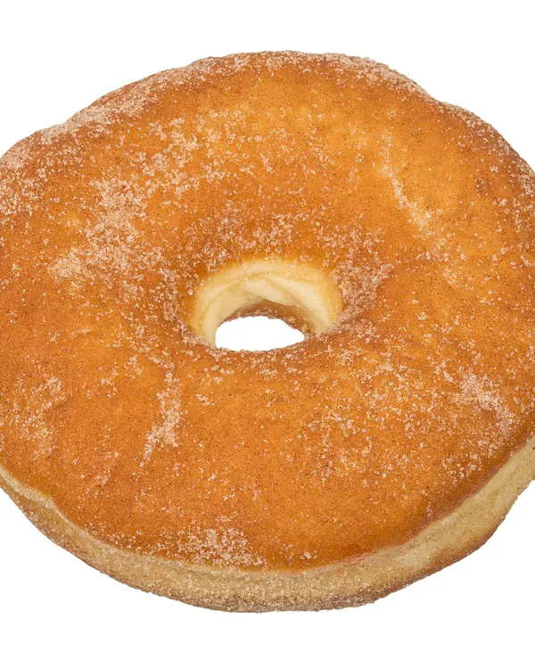 Cake doughnut rolled in cinnamon sugar