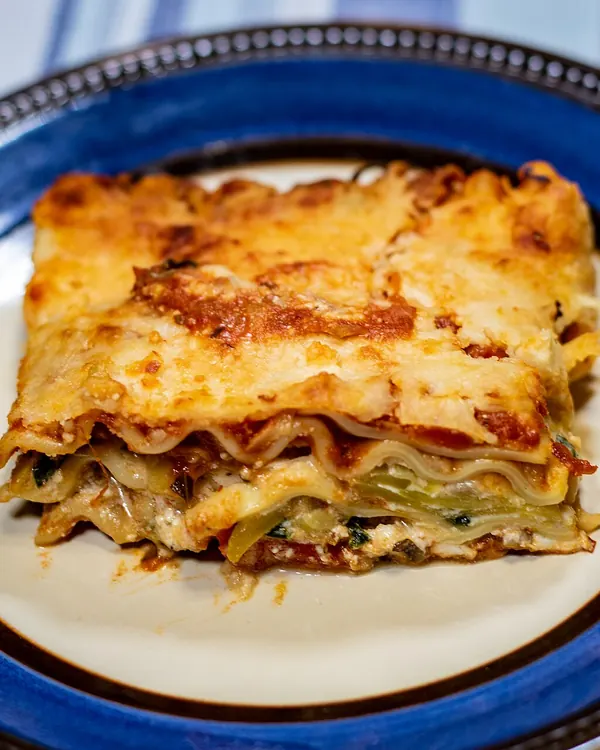 Portion of vegetable lasagna on a plate