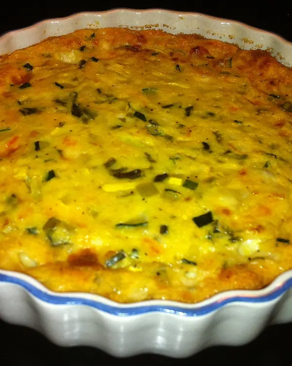Whole vegetable quiche in a fluted dish